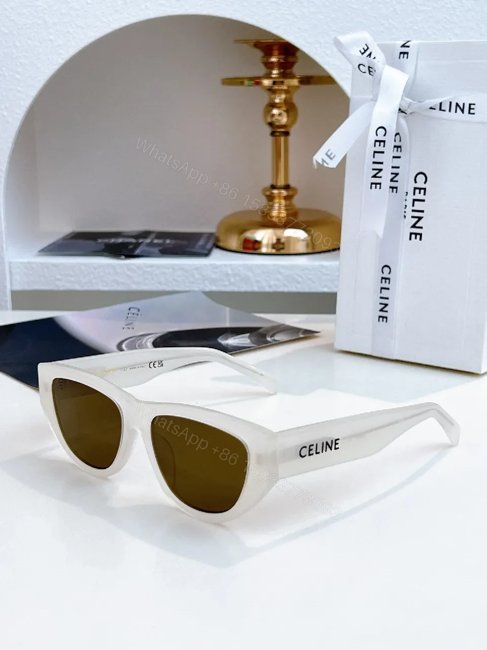 White Frame, Brown Lens Luxe Sunglasses - Sleek Cat-Eye Style — view 1
