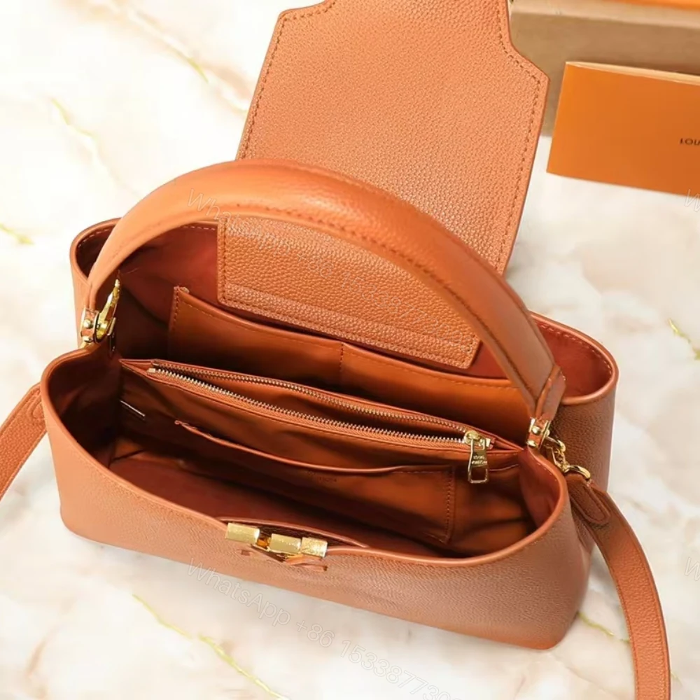 View 8 of Louis Vuitton Capucines MM Souple Cognac 33Cm M14371