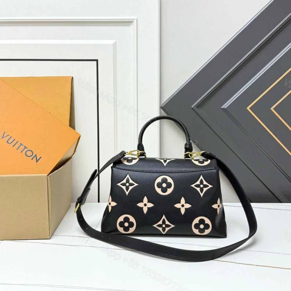 View 4 of Louis Vuitton Madeleine MM Monogram Empreinte Black Beige 30Cm