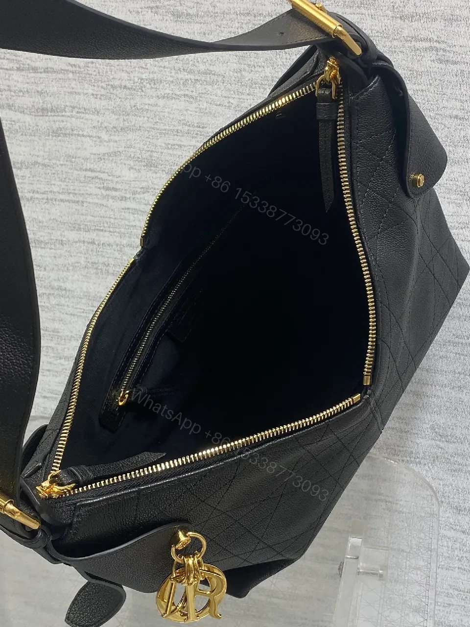 View 9 of Quilted Hobo Bag - Luxe Comfort, Gold Charm, Everyday Style