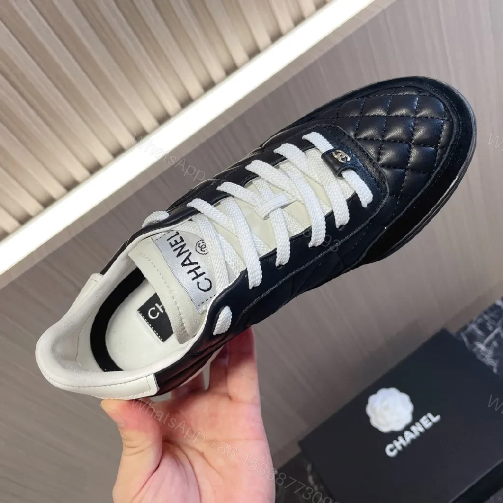 View 8 of Quilted Leather Sneaker - Dual-Texture Black & White, Luxe Comfort