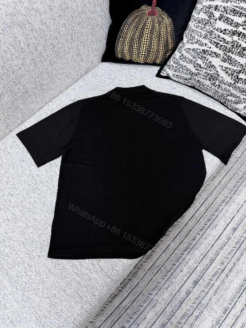 View 8 of Black Polo with Subtle Gold Logo - Refined Everyday Versatility