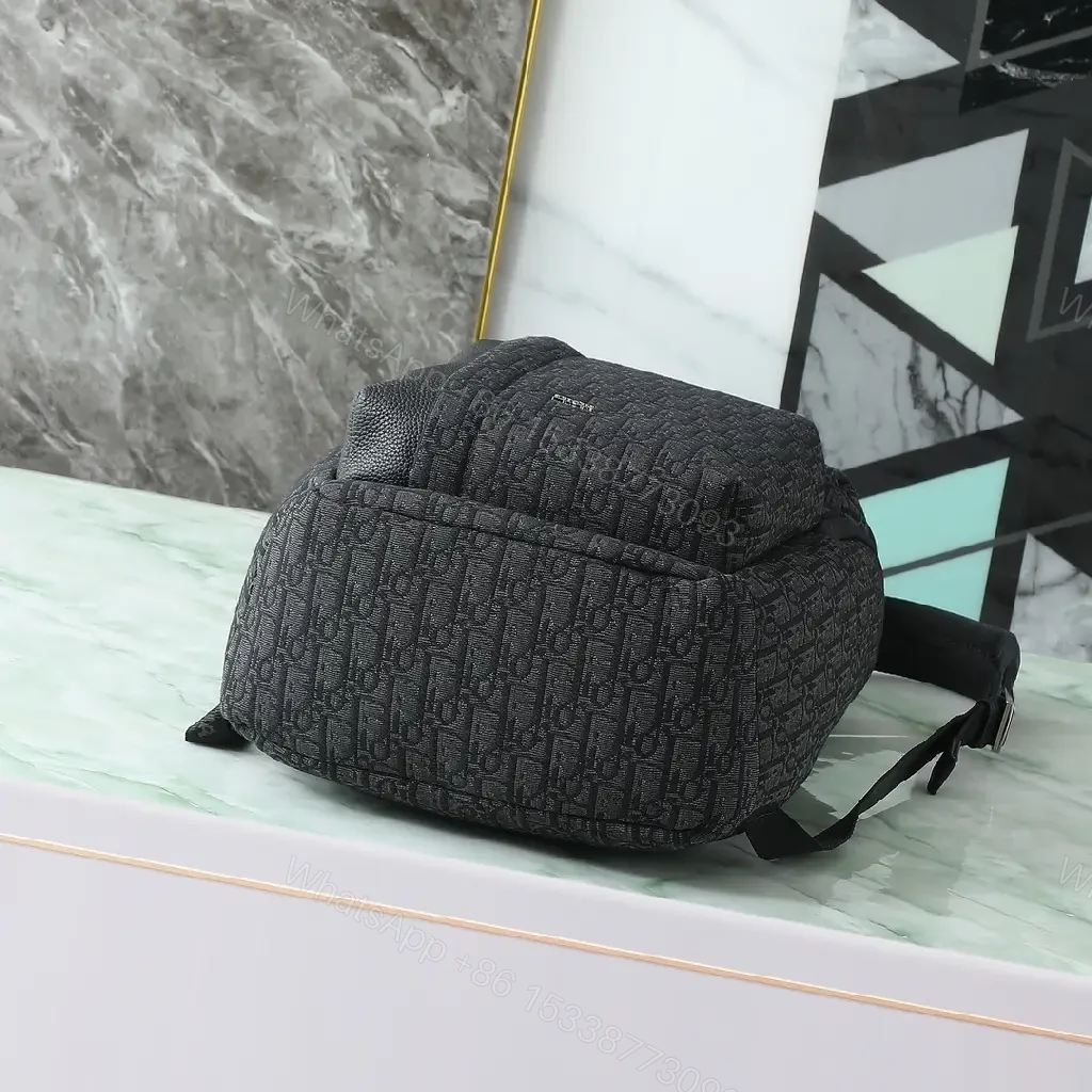 View 9 of Monogram Texture Compact Luxury Backpack - Day-to-Night Utility