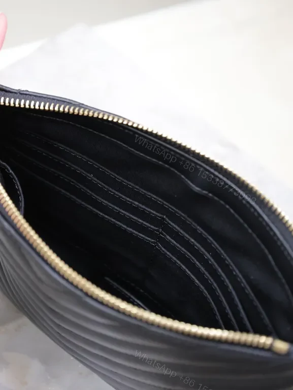 View 6 of Chic Chevron Quilted Clutch with Gold Emblem - Compact Luxury