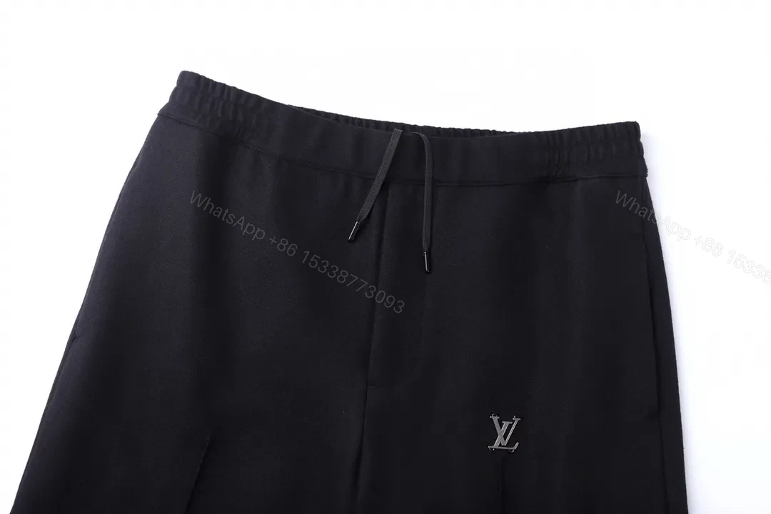 View 6 of Chic Black Wide-Leg Track Pants with Subtle Monogram Monstère