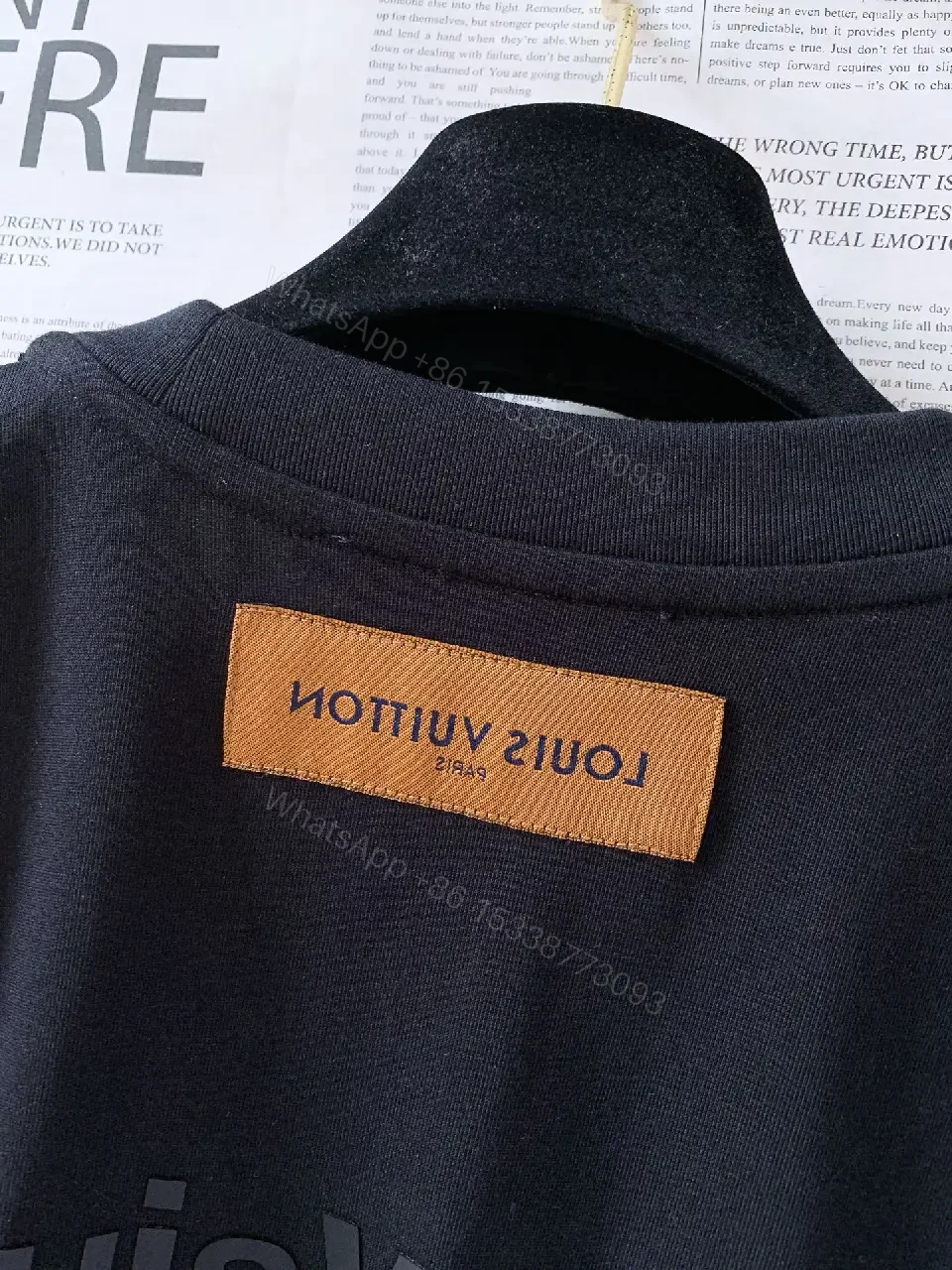View 9 of Black Solid Cotton Tee, Relaxed Fit, LV Logo Chest Crewneck Shirt