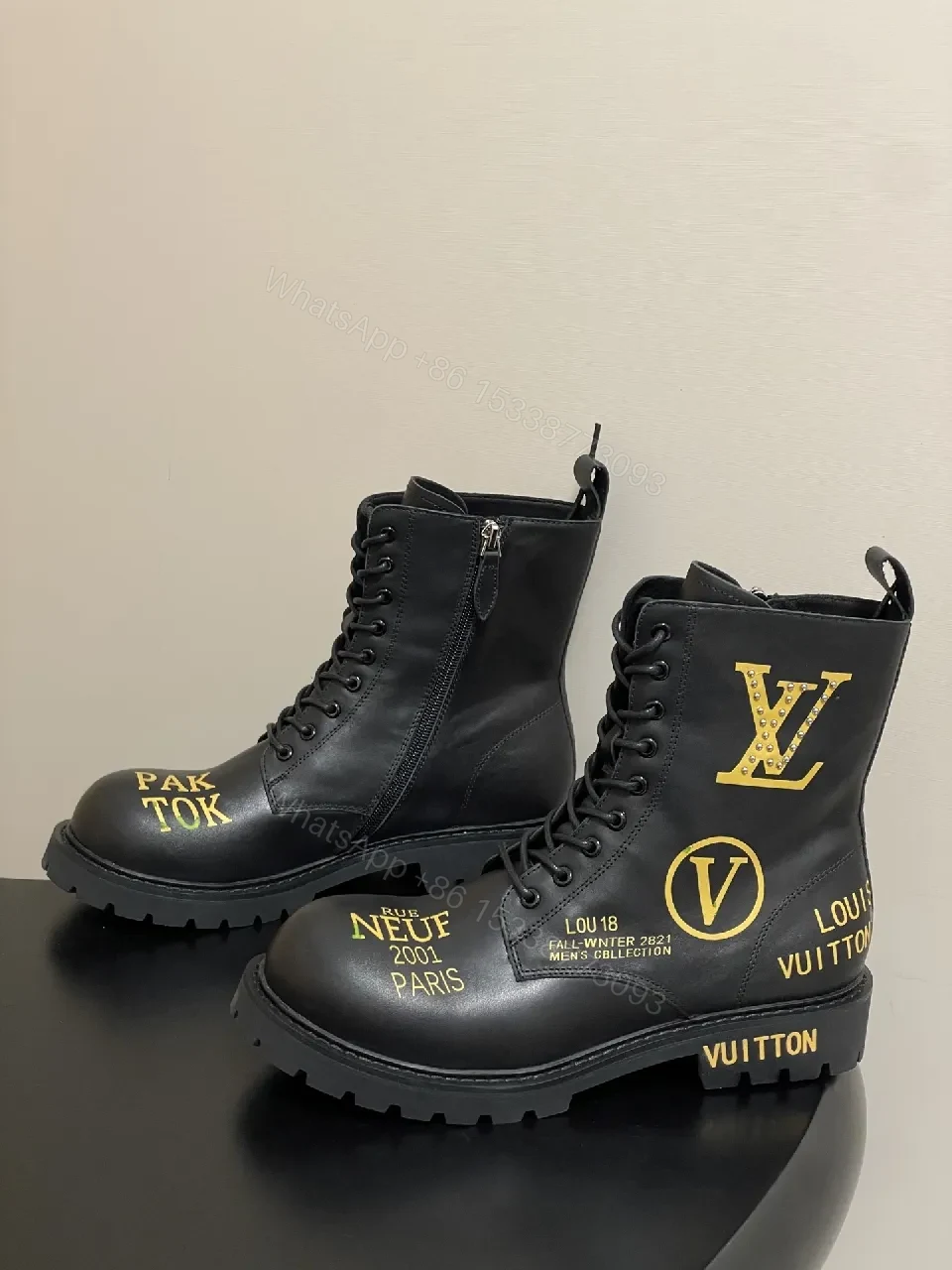 View 4 of Bold Black Combat Boots with Gold Detailing: All-Day Comfort