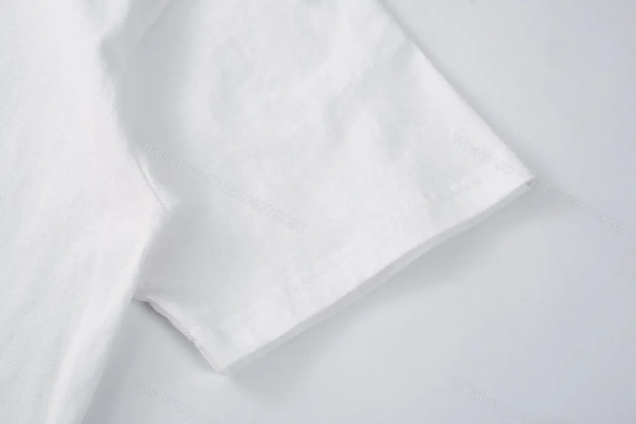 View 7 of White Cotton Minimalist Graphic Tee with Pearlescent Accent