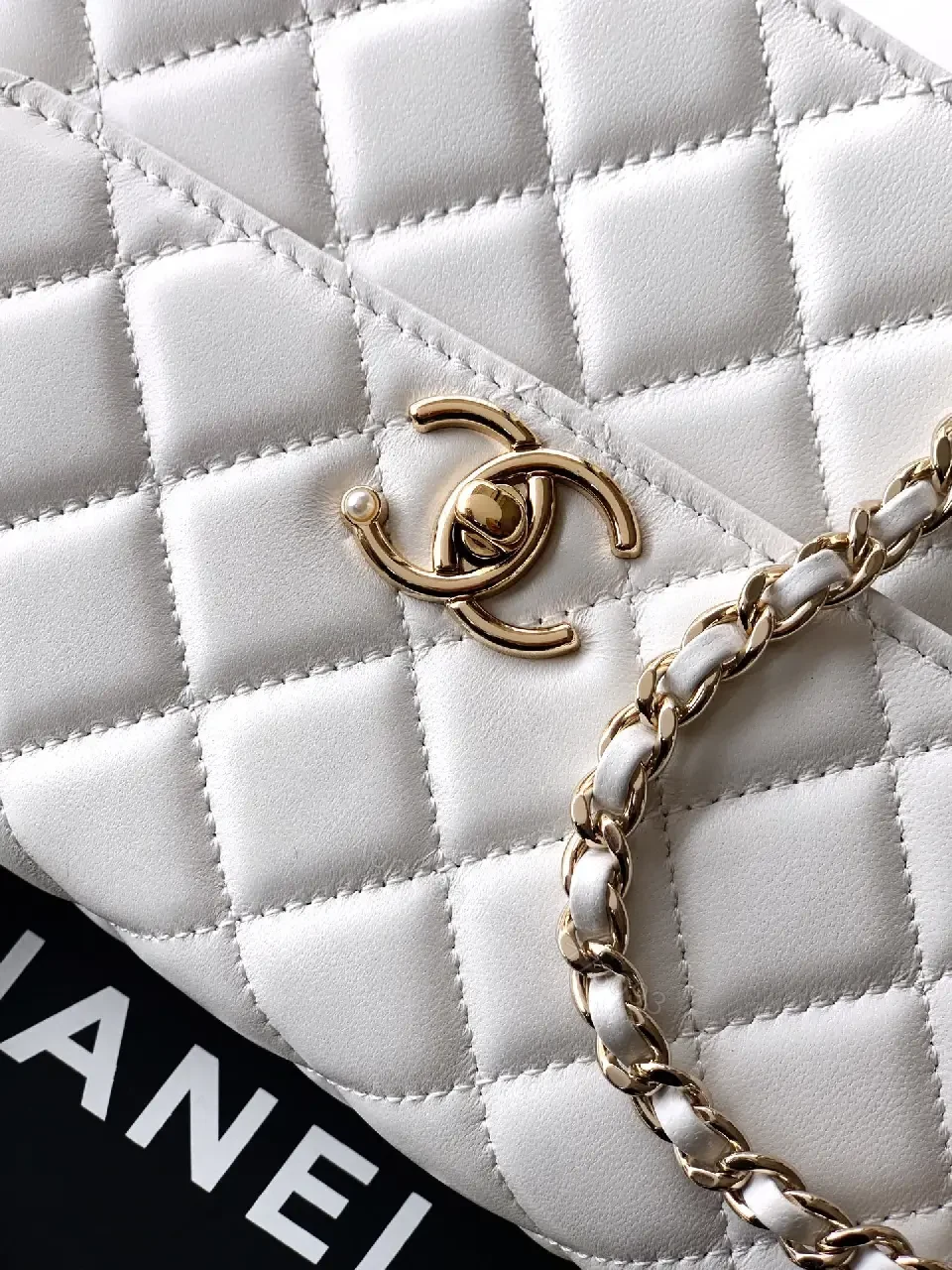 View 3 of Pearl-Chain Quilted Mini Bag - White Leather, Gold Accent, Crossbody Compact