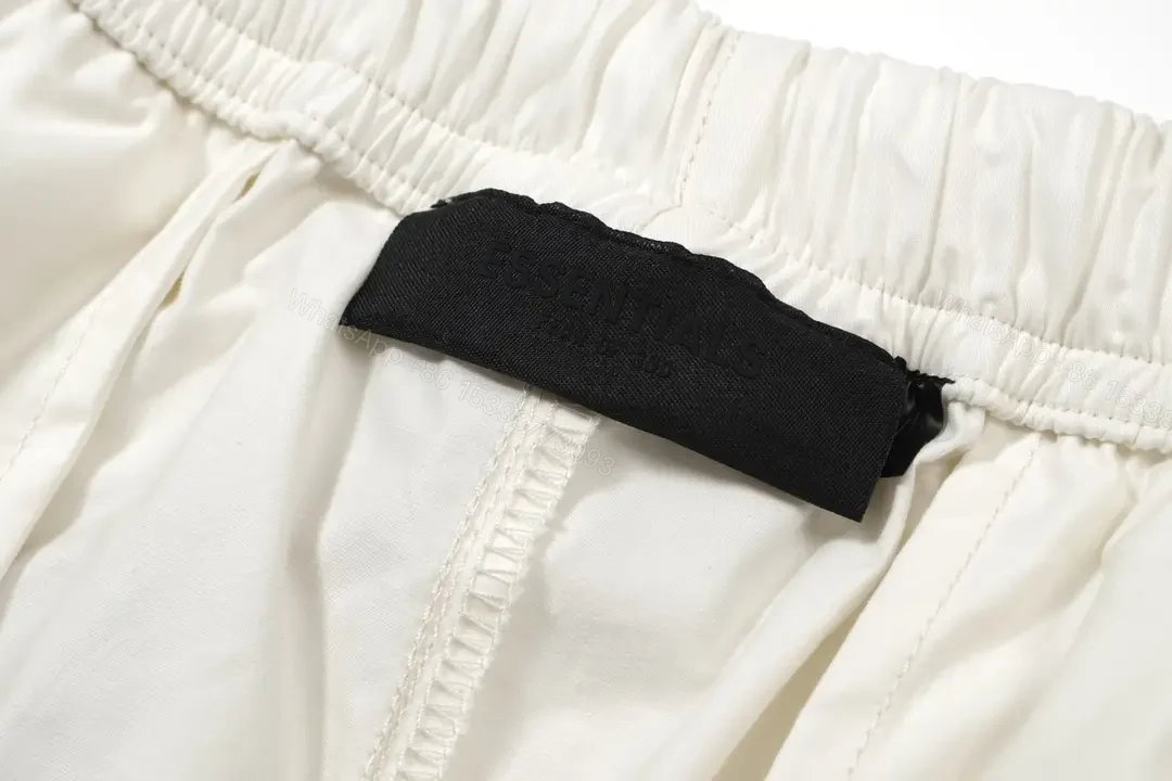 View 8 of Off-White Wide-Leg Cropped Pants with Elastic Drawstring Waist