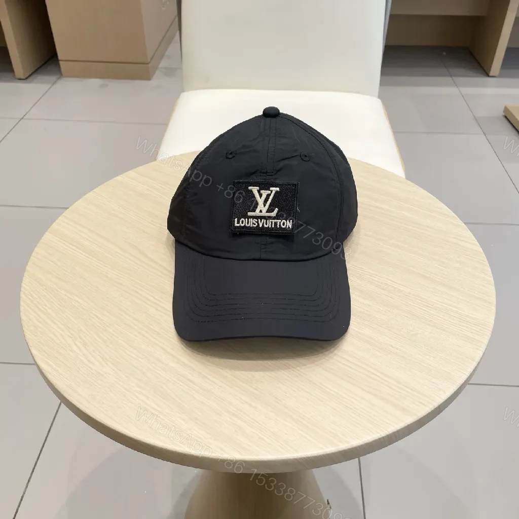 Compact Black Cap with Subtle LV Patch, Six-Panel, Adjustable Strap — view 1