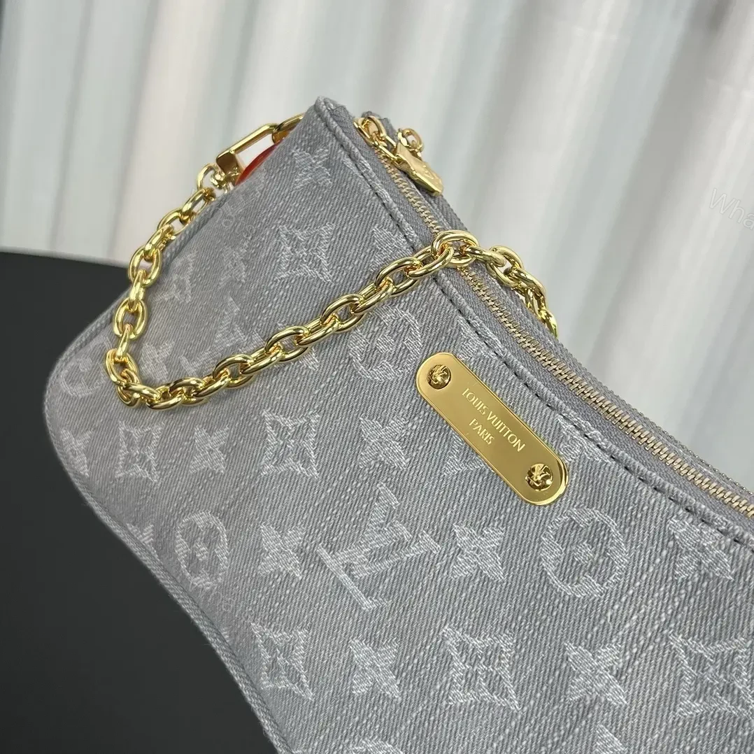 View 2 of Louis Vuitton Liv Pochette in Washed Denim