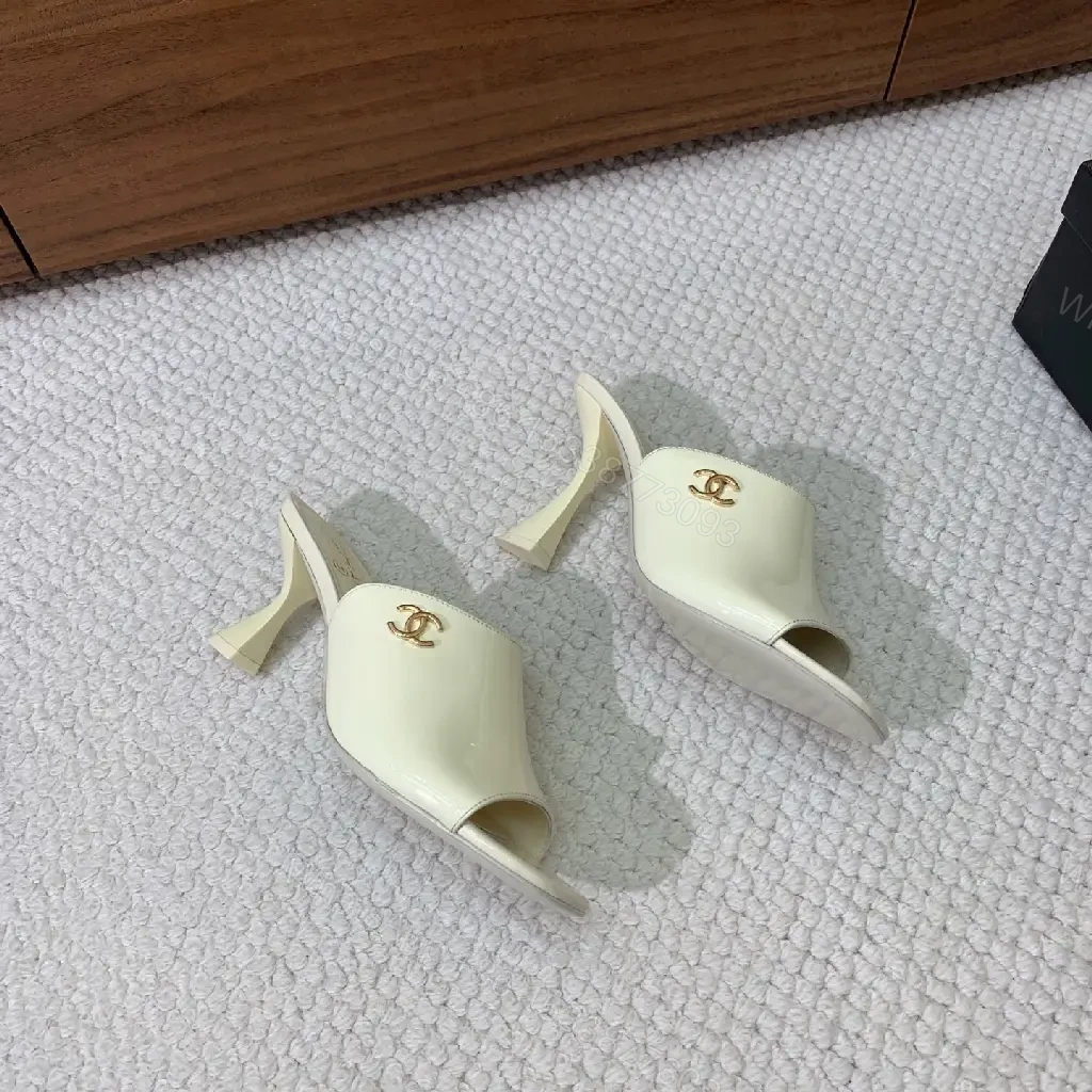 View 4 of Cream Leather Slide Sandals, Pearl White, Chanel Logo, Midsize Heel Mules