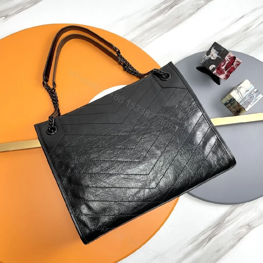 View 5 of Matte Black Quilted Leather Shoulder Bag: Chic Minimalist Style