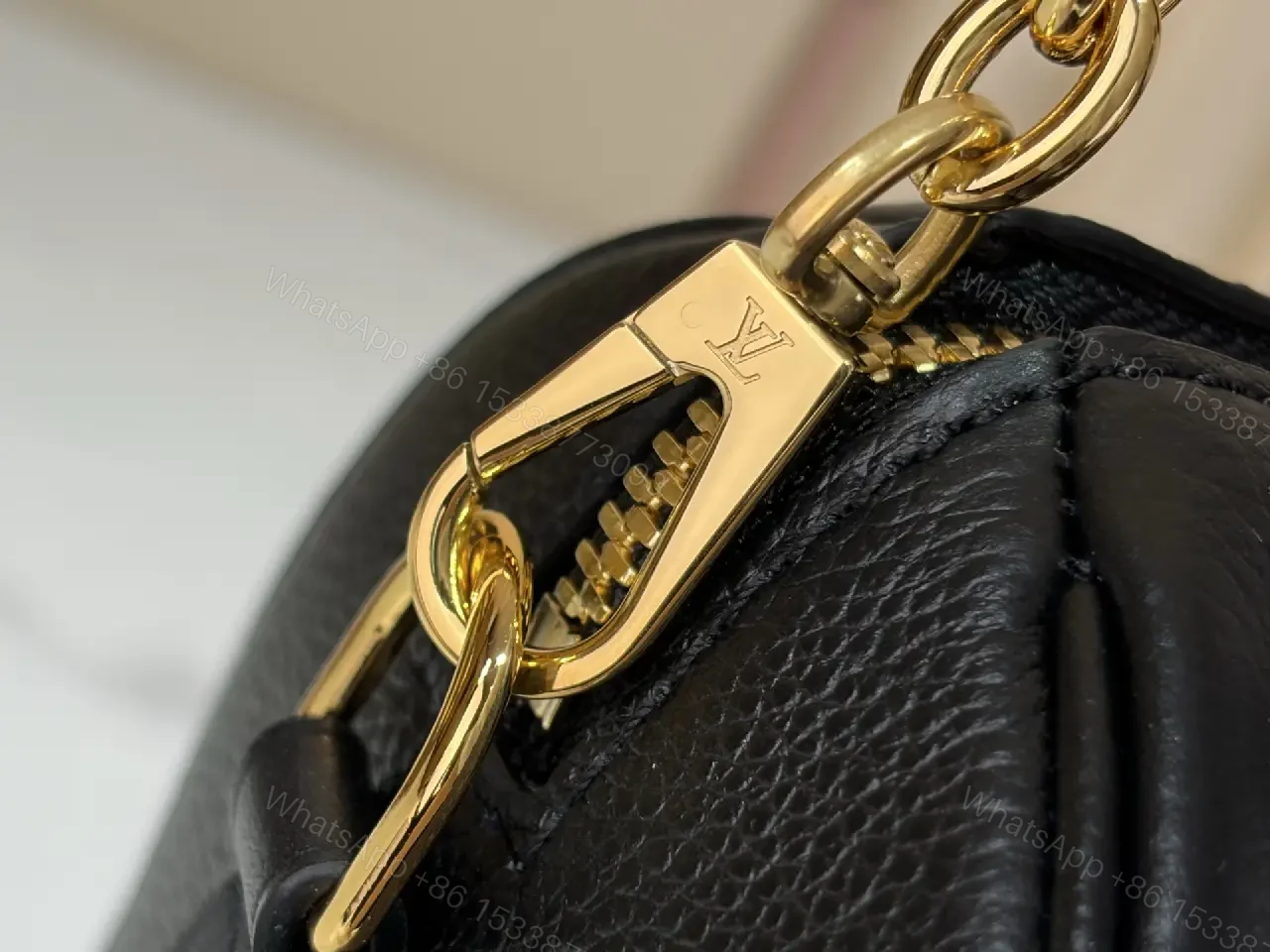 View 10 of Black Pebbled Leather Dome Handbag with Gold Details