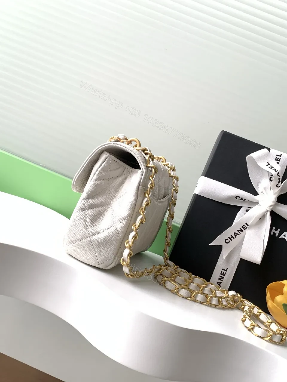 View 5 of Quilted Mini Flap Bag with Gold Chain - Classic Chic Crossbody