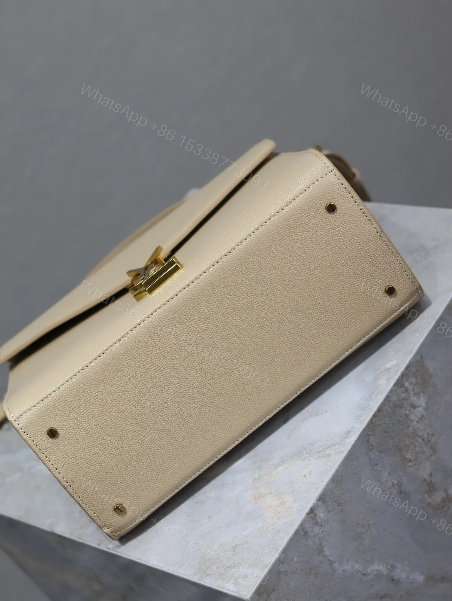 View 8 of YSL CASSANDRA TOP HANDLE BAG MEDIUM IN BEIGE CALFSKIN GOLD HARDWARE