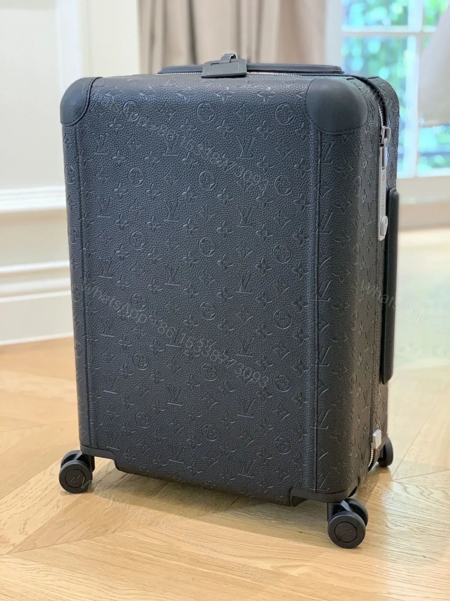 View 2 of Louis Vuitton Horizon 55 rolling suitcase