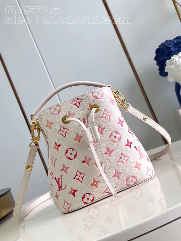 Chic Soft Pink Monogram Drawstring Bucket Bag - Luxury Style — view 1