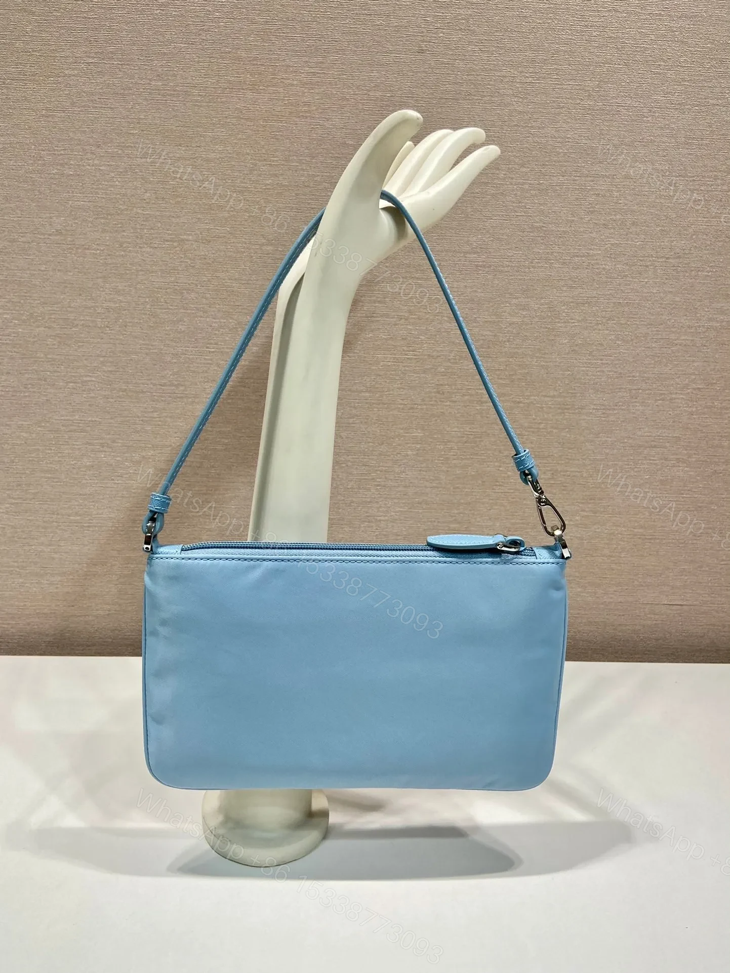 View 5 of SHOULDER BAG 24 WITH TRIANGLE LOGO IN SKY BLUE RE-NYLON FABRIC