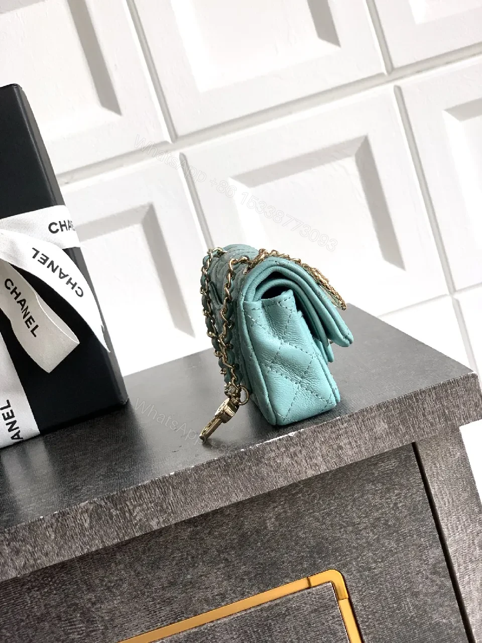 View 2 of Pastel Aqua Quilted Mini Bag with Pearl Charm (Chic)