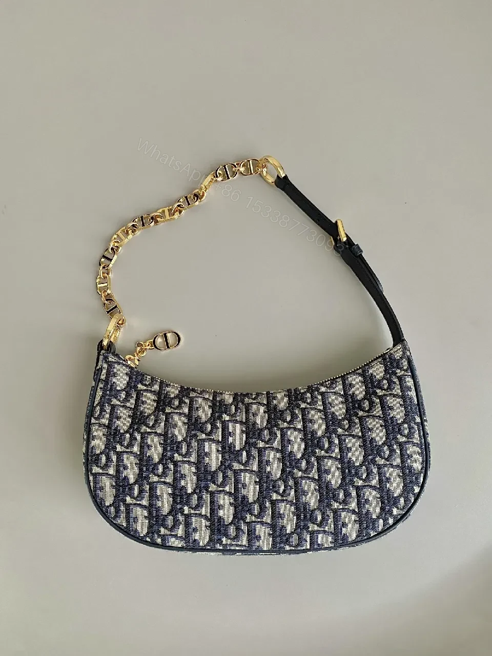 View 7 of Compact Monogram Bag: Gold Chain Accent, Leather Trim, Luxurious Compact Shoulder Bag