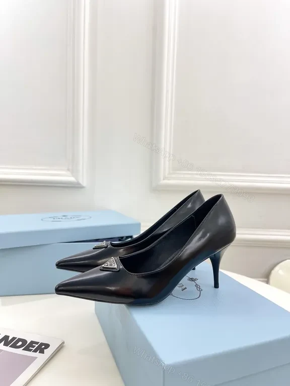 View 2 of Sleek Black Leather Pumps - Prada Hardware Chelsea-Style Pumps