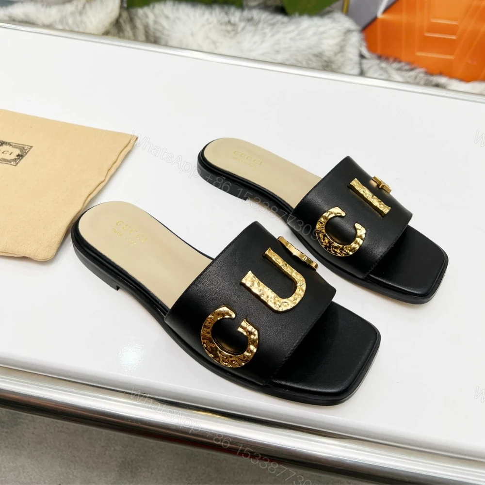 View 2 of GUCCI WOMEN’S LOGO EMBELLISHED SLIDE SANDALS BLACK
