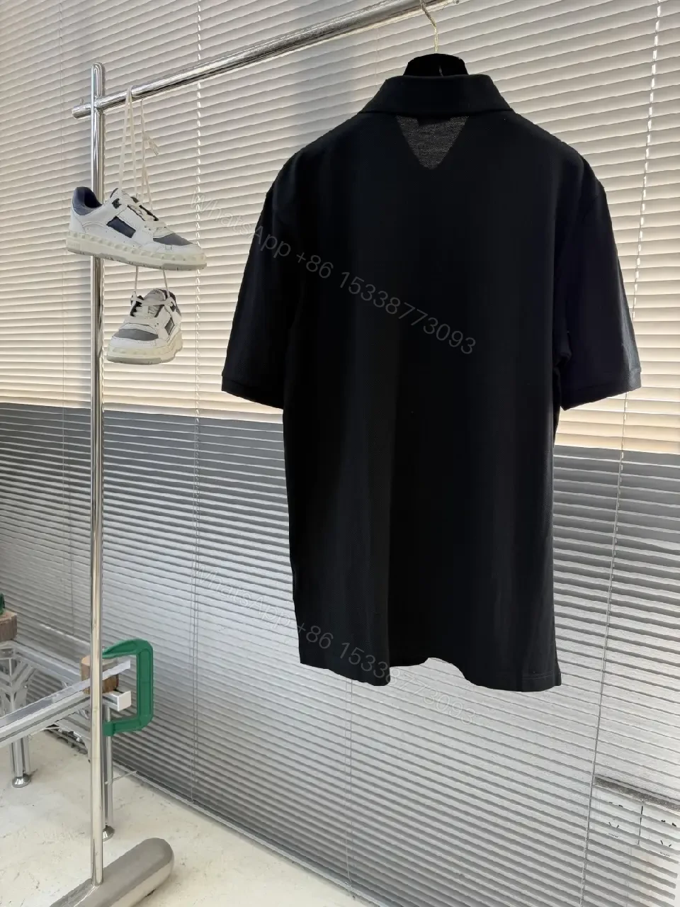 View 3 of Black Polo Tee with Green Clover – Subtle Luxe Everyday Polo