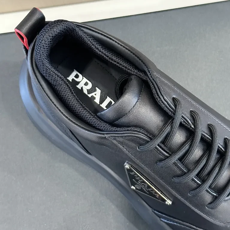 View 3 of Bold Black Leather Platform Sneaker â€” Prada Milano Style