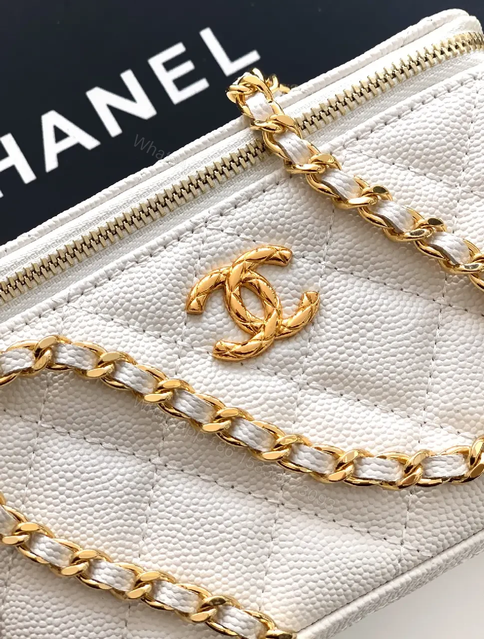 View 6 of white quilted leather bag with chain strap for everyday luxury