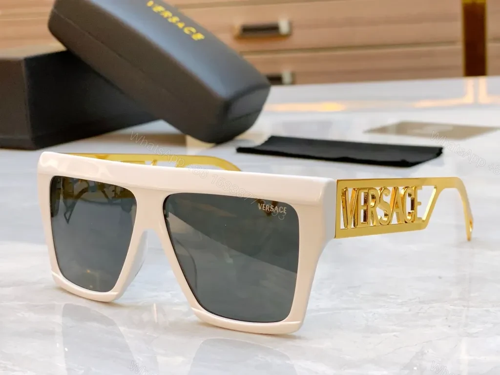 View 7 of Bold Black & Gold Luxe Sunglasses - Statement Frame, All-Day Comfort