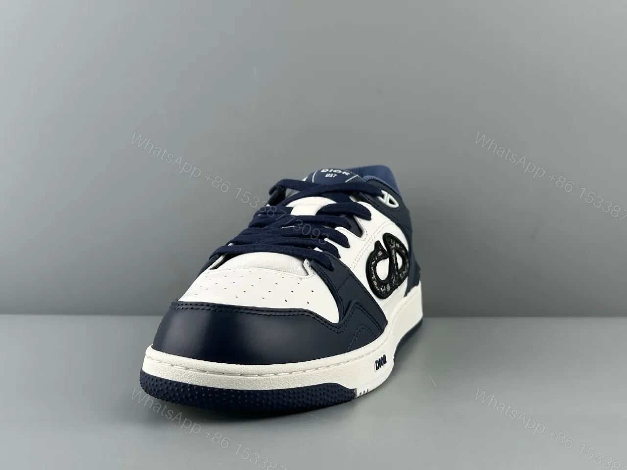 View 8 of Navy Leather High-Top Sneaker with Cutout Detailing