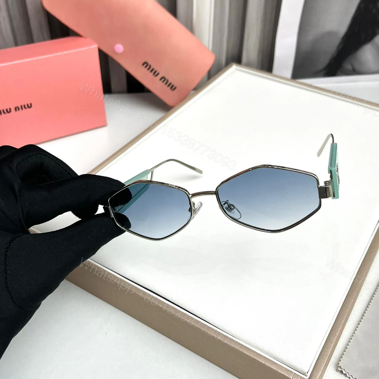 View 2 of Miu Miu Hexagon Light Green-Blue Sunglasses
