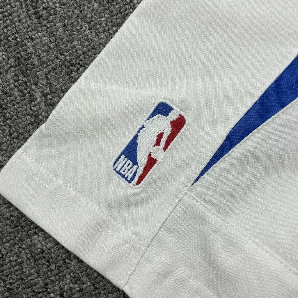 View 9 of Bold Black-White Statement Jersey Tee with Electric Blue Accents