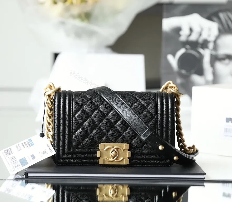 Black Calfskin Quilted Luxury Bag with Gold Hardware Clasp — view 1