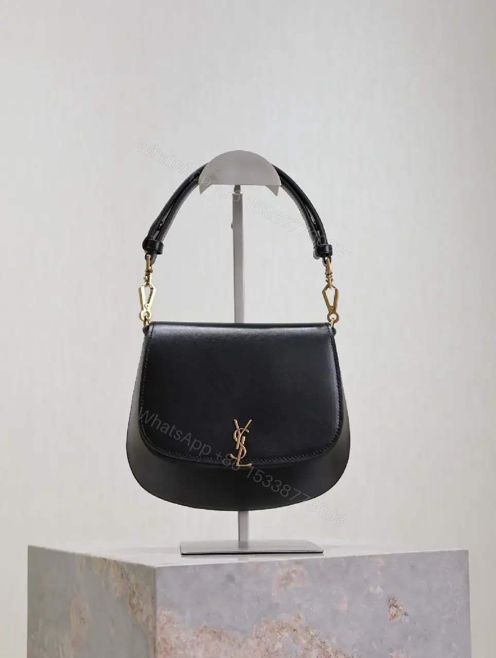 View 9 of Structured Leather Crossbody with Gold Emblem, Compact & Versatile Bag