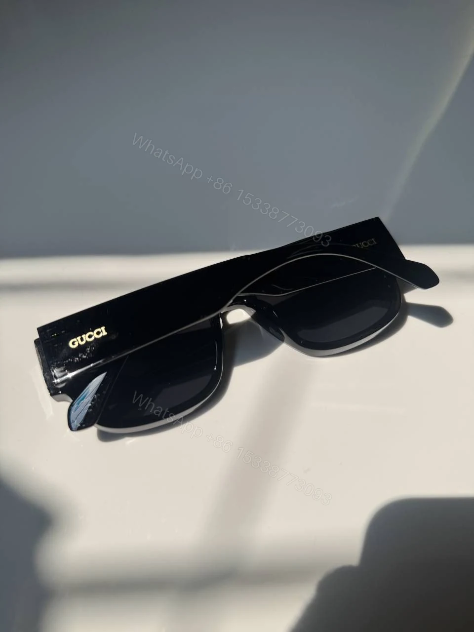 View 2 of First Copy Gucci Wraparound Sunglasses Black Frame Grey Lens