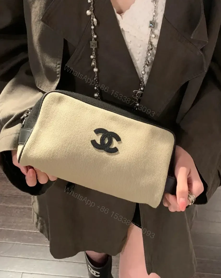 View 8 of Beige Canvas Pouch - Black Trim, Logo, Wrist Strap, Compact