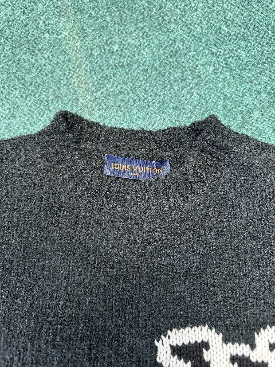 View 3 of Charcoal Knit Crewneck — Luxe Texture, Subtle Crest, Premium Comfort