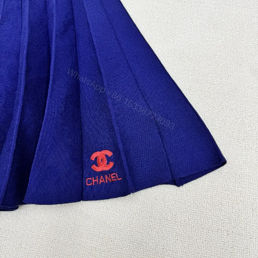 View 2 of Navy Knit Set: Pleated Midi Skirt & Striped-Detail Top
