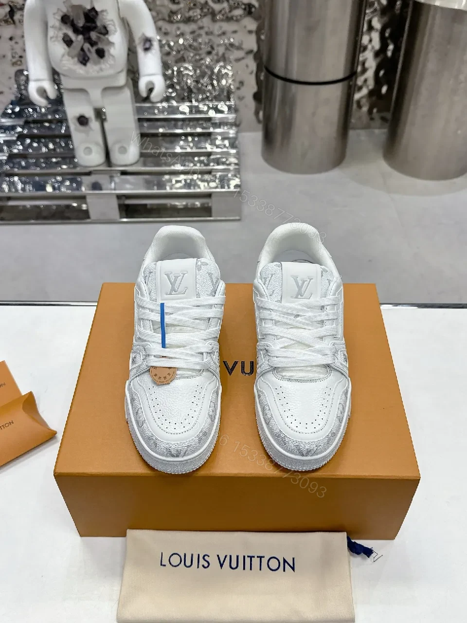 View 2 of Patterned White Leather Luxury Sneakers with Monogram Details