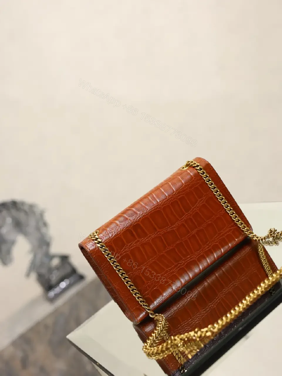 View 8 of Brown Crocodile-Embossed Leather Clutch with Gold Logo Clasp