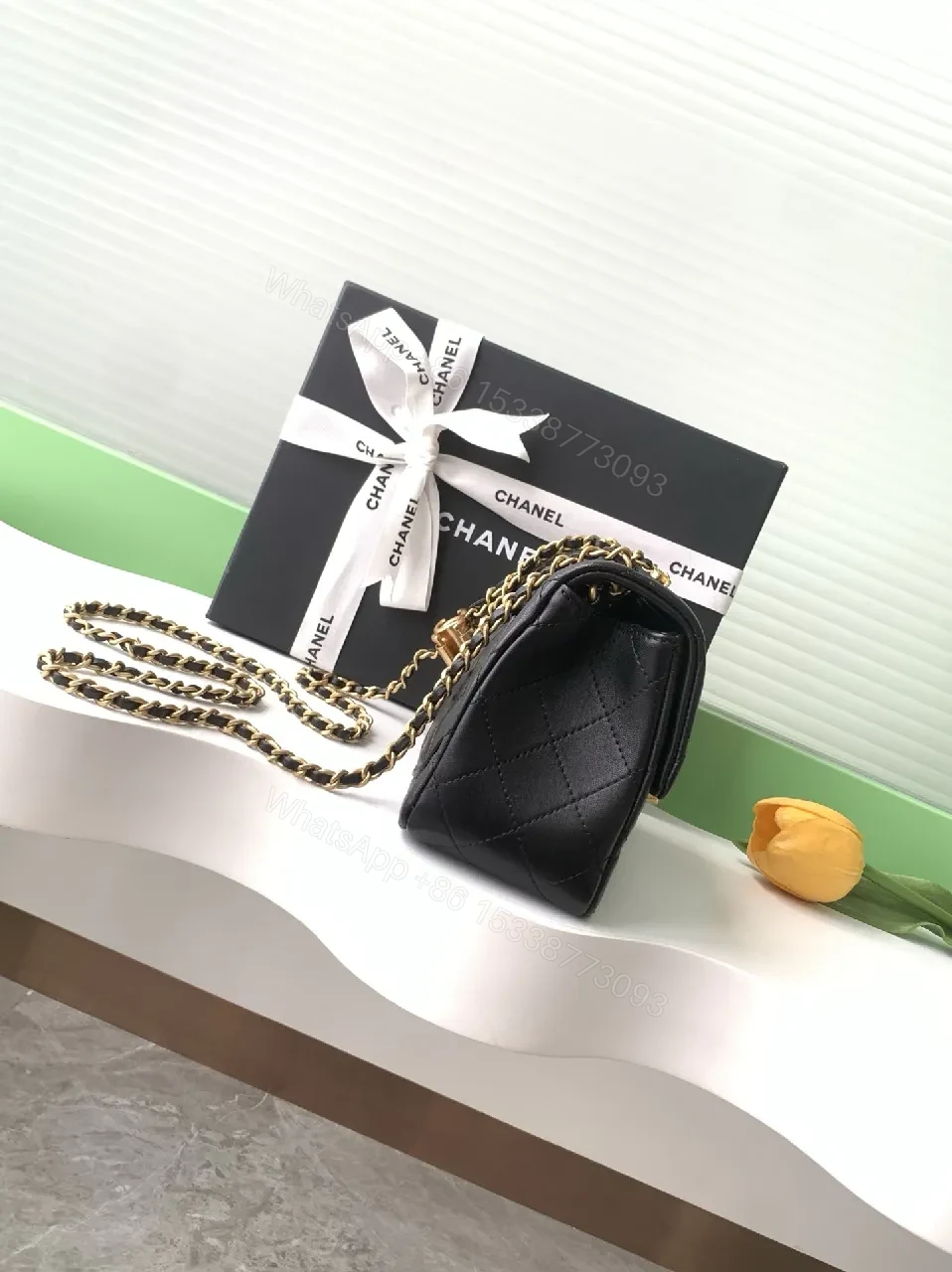 View 2 of Black Quilted Calfskin Bag - Modern Flap, Gold Chain, Luxe Essential