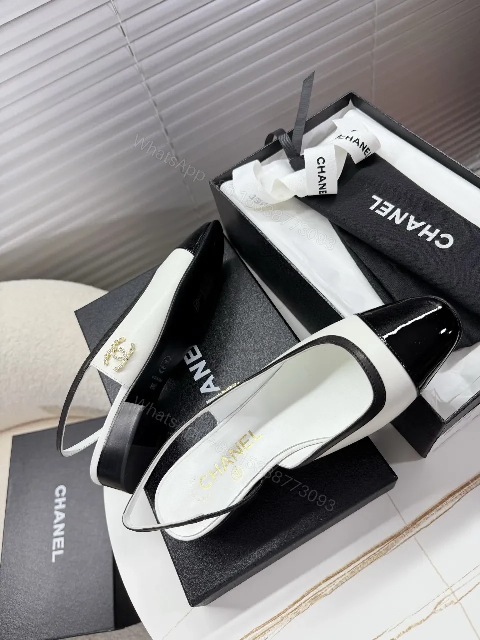 View 7 of Two-Tone Patent Slingback Pumps: Sharp Architectural Elegance