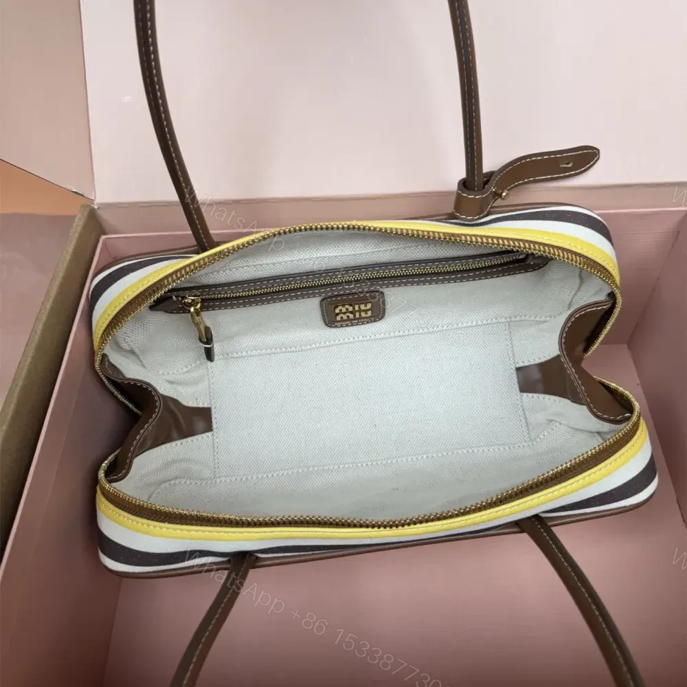 View 7 of 高仿miumiu*Beau系列5BB173牛皮帆布手提包米棕色免檢版