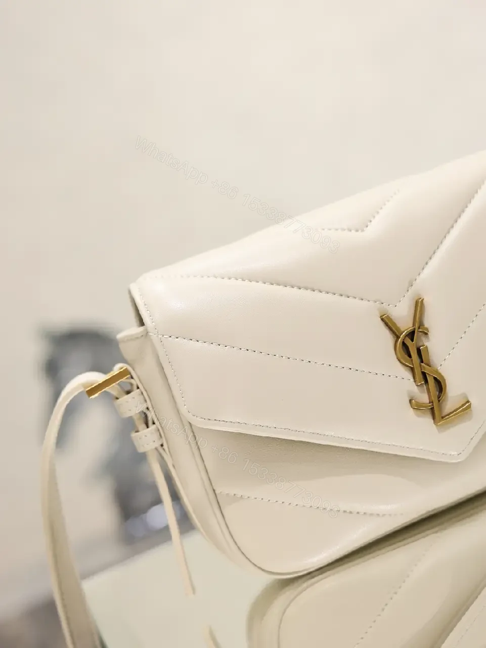 View 6 of Off-White Cream Leather Mini Crossbody Bag with Chevron Front Feature