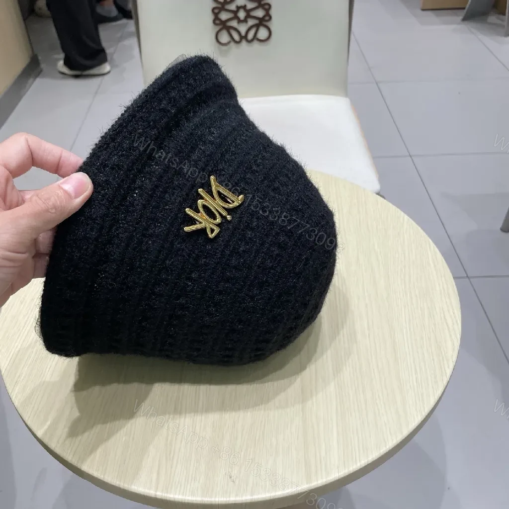 View 7 of Black Knit Bucket Hat with Gold Emblem, Premium Texture, Everyday Luxury