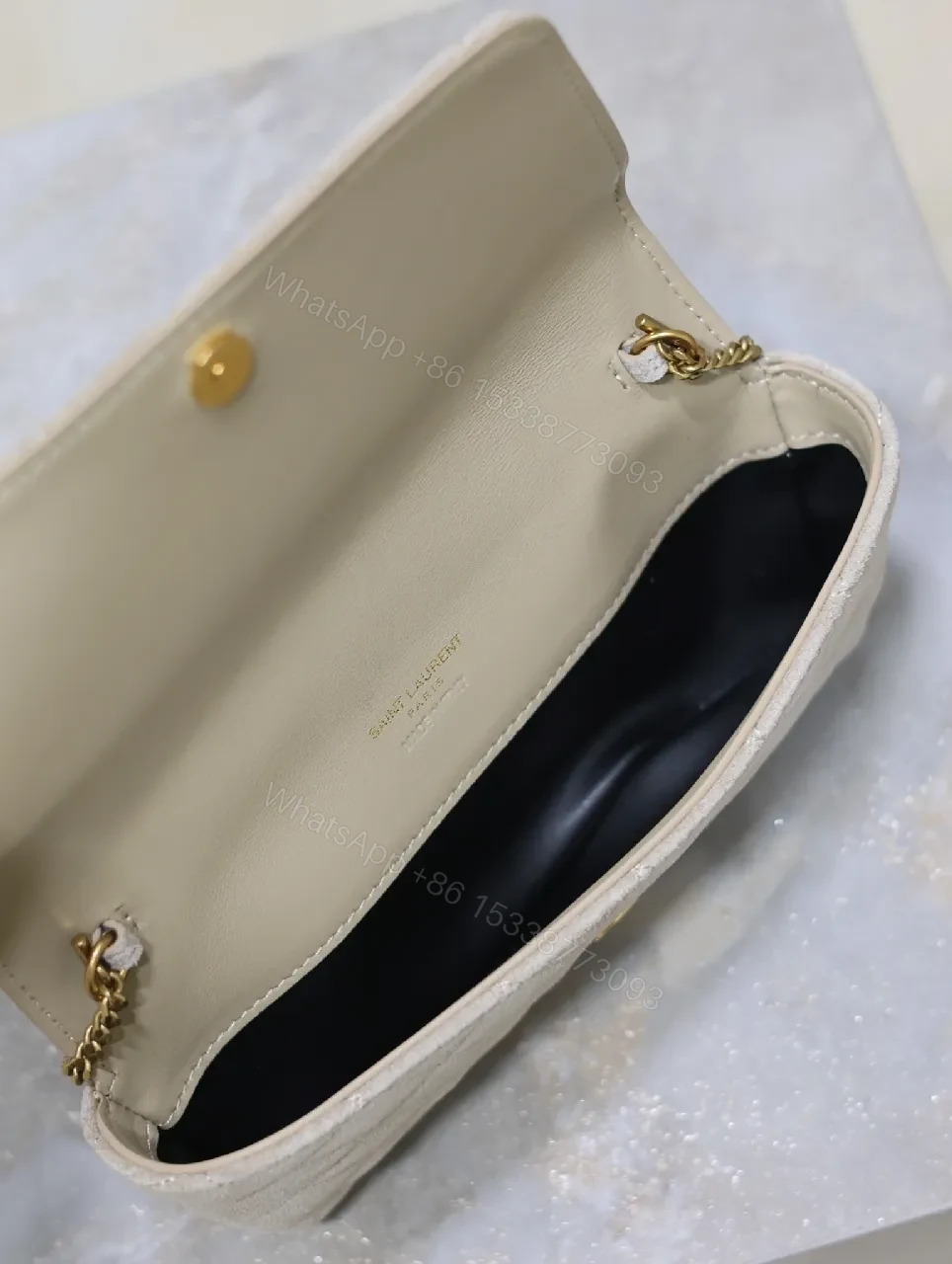 View 4 of Quilted Suede Clutch with Gold Logo Hardware - Classic Chic Clutch