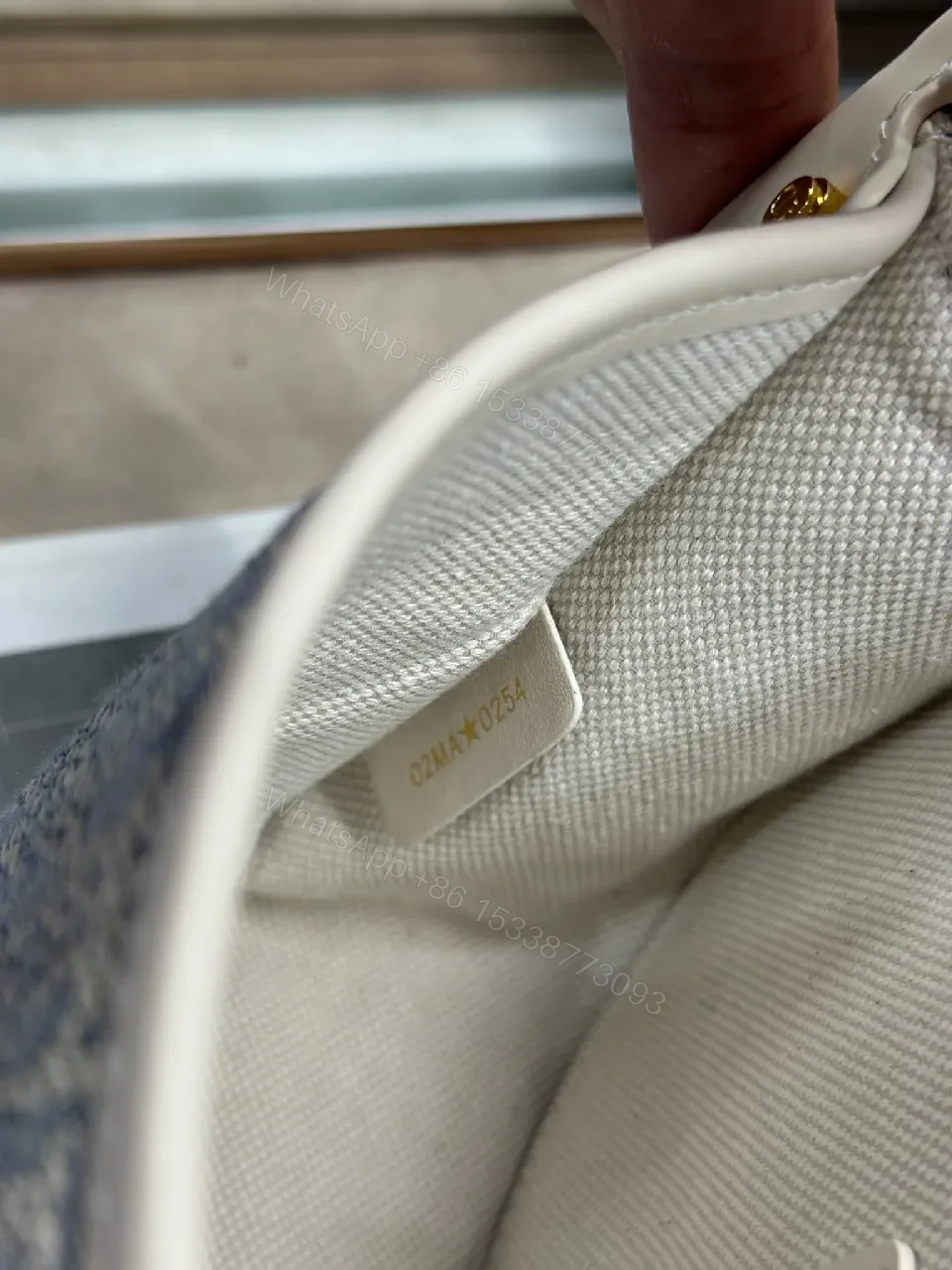 View 9 of Textured Denim-Trim Micro Bag with Gold-Hardware